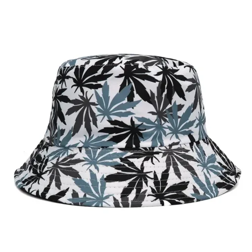 a black and white bucket hat with leaves on it