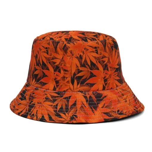 a orange and black hat with leaves on it